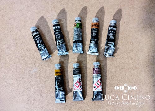 Colore nel restauro: ritocco mobili legno Genova