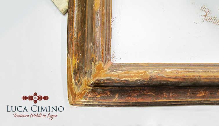 Restauro della cornice di un quadro del Seicento genovese