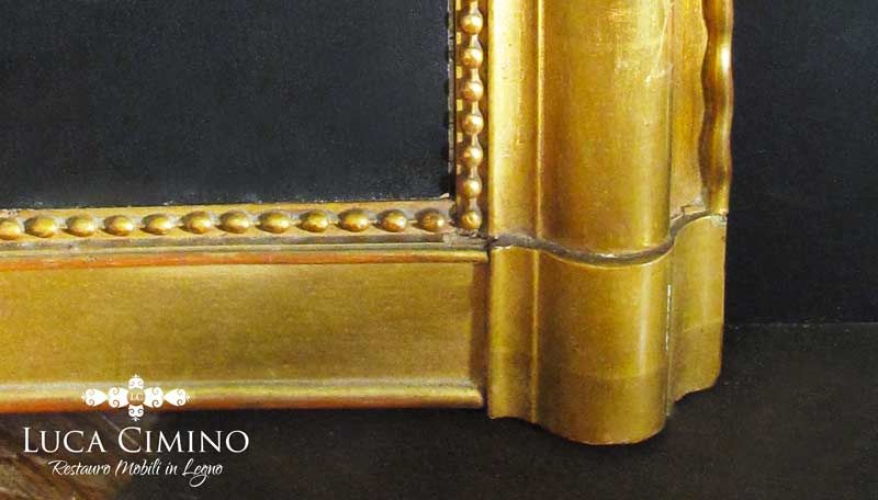 Restauro di una cornice dorata ottocentesca
